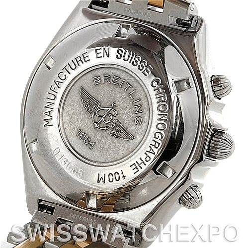 This image shows the back case and crown side of the Breitling Windrider D13055 Men
s Stainless Steel White Dial D13055 Men
s Stainless Steel White Dial watch, highlighting its engravings and details.