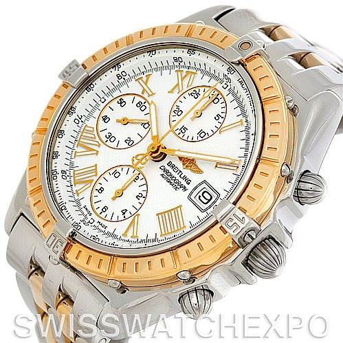 This image shows a close-up of a Breitling Windrider D13055 Men
s Stainless Steel White Dial D13055 Men
s Stainless Steel White Dial watch, highlighting its face, bezel, and part of the bracelet.