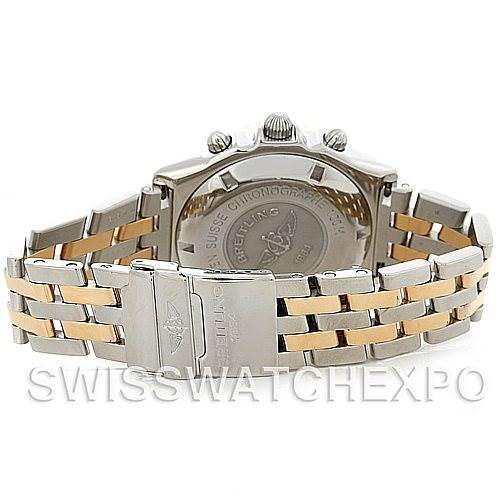 The image shows the back view of a Breitling Windrider D13055 Men
s Stainless Steel White Dial D13055 Men
s Stainless Steel White Dial watch, highlighting its clasp, case back, and bracelet.