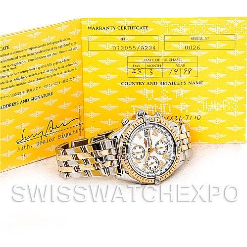 The image shows a Breitling Windrider D13055 Men
s Stainless Steel White Dial D13055 Men
s Stainless Steel White Dial watch with a visible bracelet, case, and dial, accompanied by its warranty certificate.