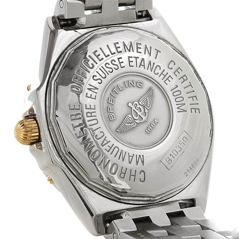 The image shows the backside of a Breitling Windrider B10350 Men's Steel and Gold (two tone) White Dial B10350 Men's Steel and Gold (two tone) White Dial watch, displaying the engraved case back and part of the bracelet.
