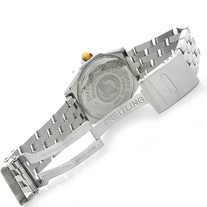 The image shows the backside and clasp of a Breitling Windrider B10350 Men's Steel and Gold (two tone) White Dial B10350 Men's Steel and Gold (two tone) White Dial watch, displaying its stainless steel bracelet and markings.