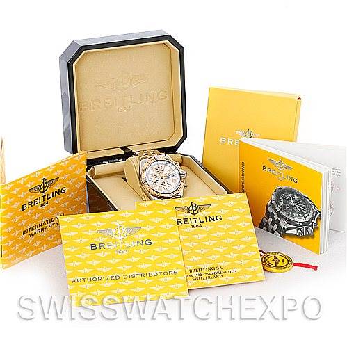 The image shows a Breitling Windrider D13355 Men's Steel and Gold (two tone) White Dial D13355 Men's Steel and Gold (two tone) White Dial watch along with its box, warranty cards, user manual, and additional paperwork from a top-down angle.