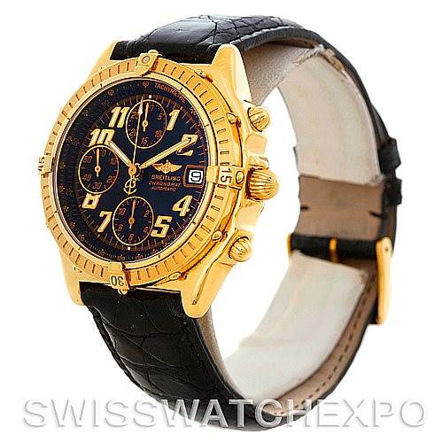 The image shows a Breitling Windrider K13350 Men's Steel and Gold (two tone) Black Dial K13350 Men's Steel and Gold (two tone) Black Dial watch angled to display its face, bezel, chronograph dials, and leather strap.