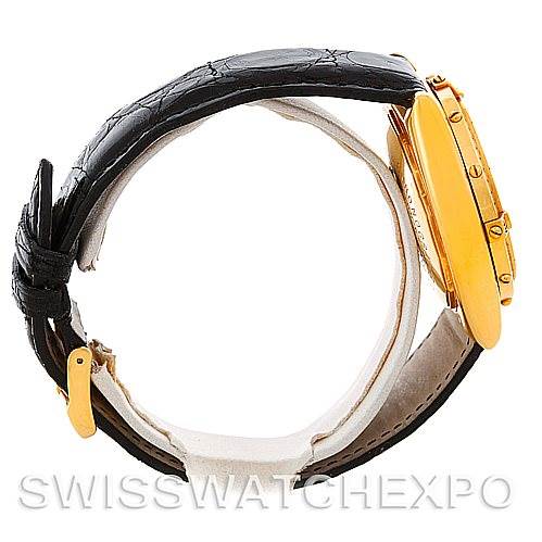 This image shows a side view of a Breitling Windrider K13350 Men's Steel and Gold (two tone) Black Dial K13350 Men's Steel and Gold (two tone) Black Dial watch, highlighting the leather strap and gold case with buttons.