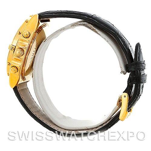 The image shows a side view of a Breitling Windrider K13350 Men's Steel and Gold (two tone) Black Dial K13350 Men's Steel and Gold (two tone) Black Dial watch detailing its gold case and black leather strap.