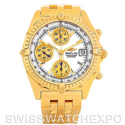 This image shows a frontal view of a Breitling Windrider K13350 Men's Yellow Gold White Dial K13350 Men's Yellow Gold White Dial watch, highlighting its dial, subdials, case, bezel, crown, and bracelet.