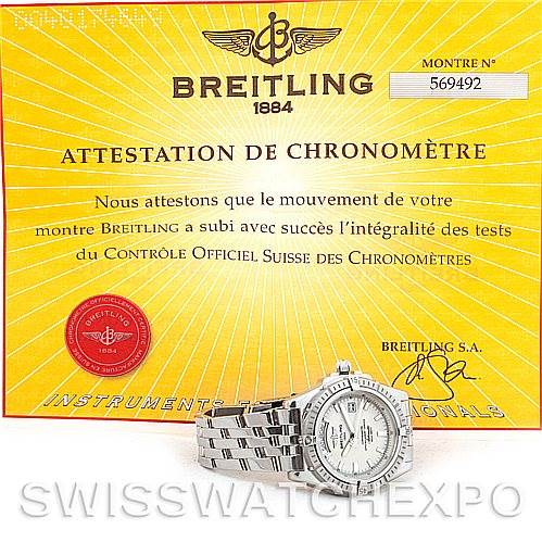 The image shows a Breitling Windrider A45355 Men's Stainless Steel White Dial A45355 Men's Stainless Steel White Dial watch placed in front of its attestation de chronomètre certificate.