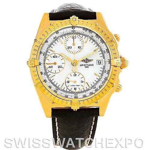The image shows a frontal view of the Breitling Windrider K13048 Men's Yellow Gold White Dial K13048 Men's Yellow Gold White Dial watch, highlighting its gold case, white dial with subdials, and black leather strap.