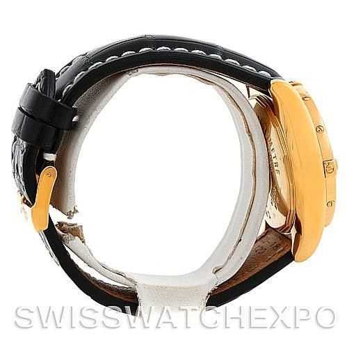 The image shows a side view of a Breitling Windrider K13358 Men's Yellow Gold Mother of Pearl Dial K13358 Men's Yellow Gold Mother of Pearl Dial watch with its black leather strap and gold case visible.