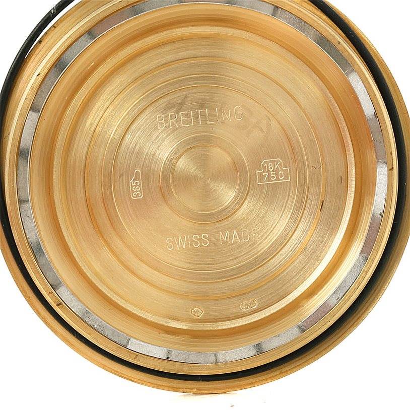 The image shows the engraved inside case back of a Breitling Windrider K13055 Men
s Yellow Gold Blue Dial K13055 Men
s Yellow Gold Blue Dial model watch.