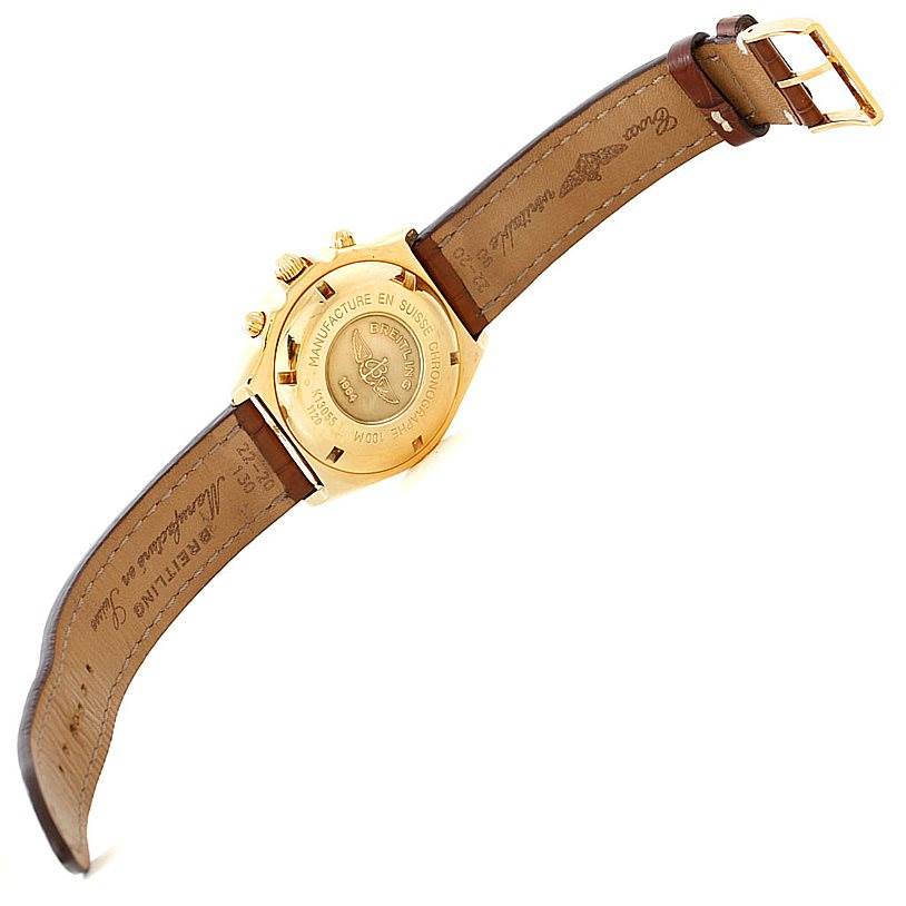 The image shows the back view and leather strap of a Breitling Windrider K13055 Men
s Yellow Gold Blue Dial K13055 Men
s Yellow Gold Blue Dial model watch.