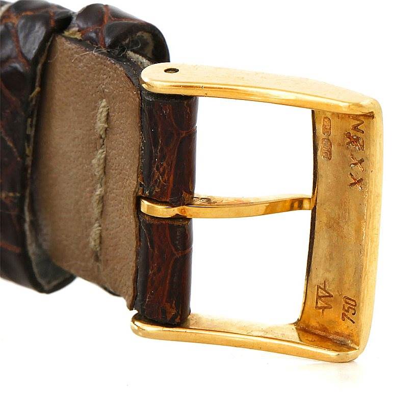 The image shows a close-up of the leather strap and gold buckle of a Breitling Windrider K55046 Men's Yellow Gold White Dial K55046 Men's Yellow Gold White Dial watch.