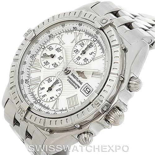 The image shows a Breitling Windrider A13355 Men's Stainless Steel White Dial A13355 Men's Stainless Steel White Dial watch at an angled top view, highlighting its face, bezel, chronograph dials, and stainless steel bracelet.