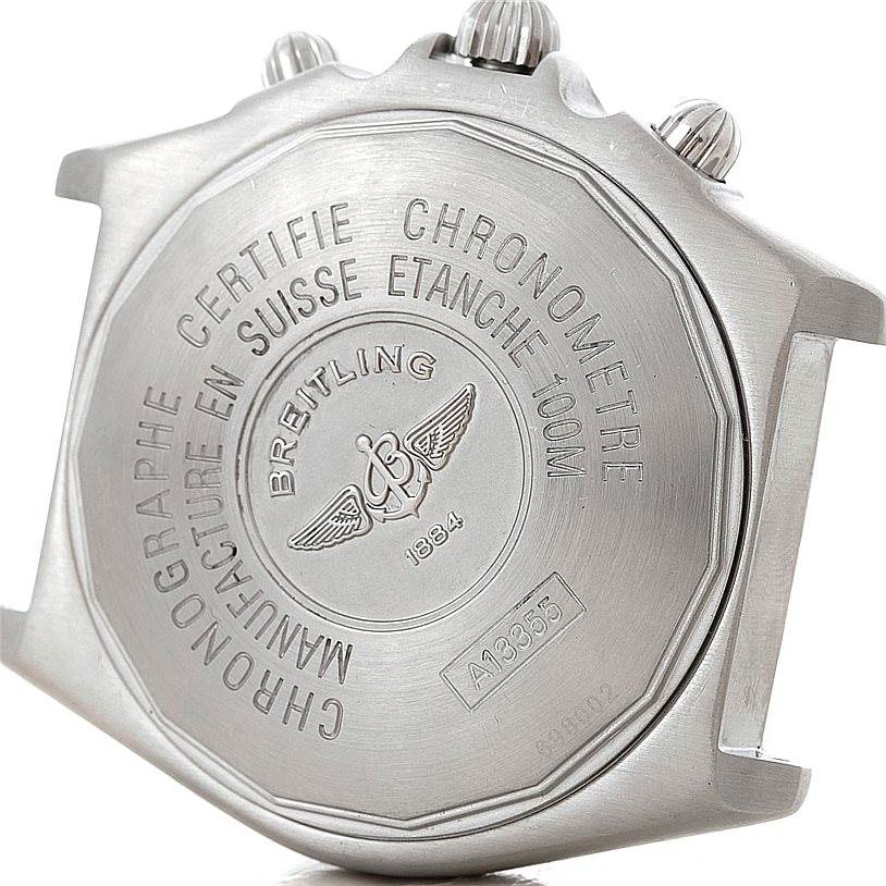 This image shows the back case of the Breitling Windrider A13355 Men's Stainless Steel Silver Dial A13355 Men's Stainless Steel Silver Dial watch, displaying its engraved details and crowns.