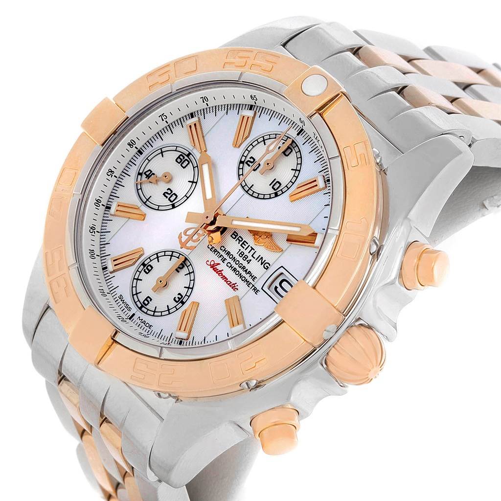 The Breitling Windrider C13358 Steel and Gold (two tone) Mother of Pearl Dial C13358 Steel and Gold (two tone) Mother of Pearl Dial watch is shown at an angled view, displaying its face, bezel, crown, and chronograph pushers.