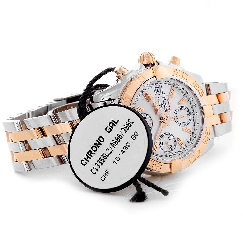 The image shows the face and bracelet of a Breitling Windrider C13358 Steel and Gold (two tone) Mother of Pearl Dial C13358 Steel and Gold (two tone) Mother of Pearl Dial watch along with its price tag.