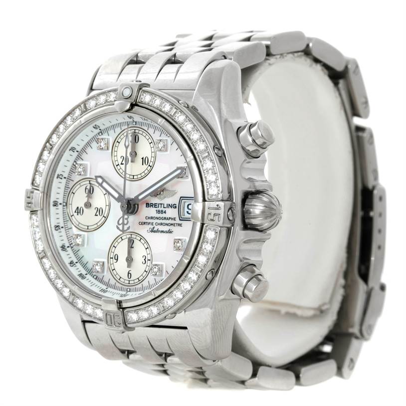 The image shows a side angle view of the Breitling Windrider A13358 Stainless Steel Mother of Pearl Dial A13358 Stainless Steel Mother of Pearl Dial watch, highlighting its face, bezel, crown, pushers, and bracelet.