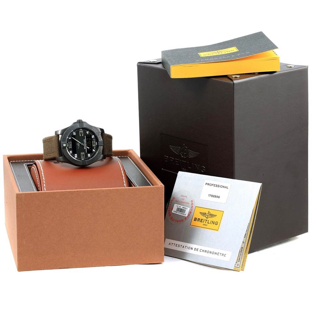 The image shows a Breitling Professional Series E56062 Men's Titanium Grey Dial E56062 Men's Titanium Grey Dial watch with its box, manual, and documents from a front angle.