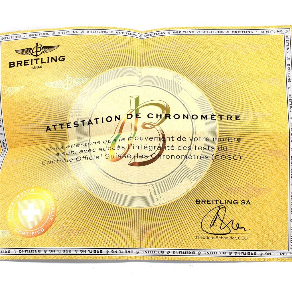 The image shows a chronometer certification for a Breitling Professional Series E56062 Men's Titanium Grey Dial E56062 Men's Titanium Grey Dial watch from an overhead angle.