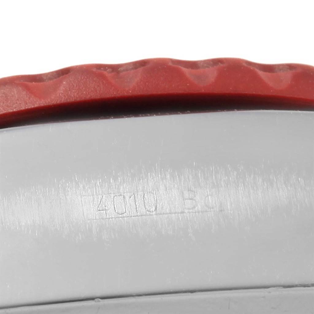 This close-up image shows a portion of the bezel and case of the Breitling Professional Series M27363 Men's Stainless Steel Black Dial M27363 Men's Stainless Steel Black Dial watch.