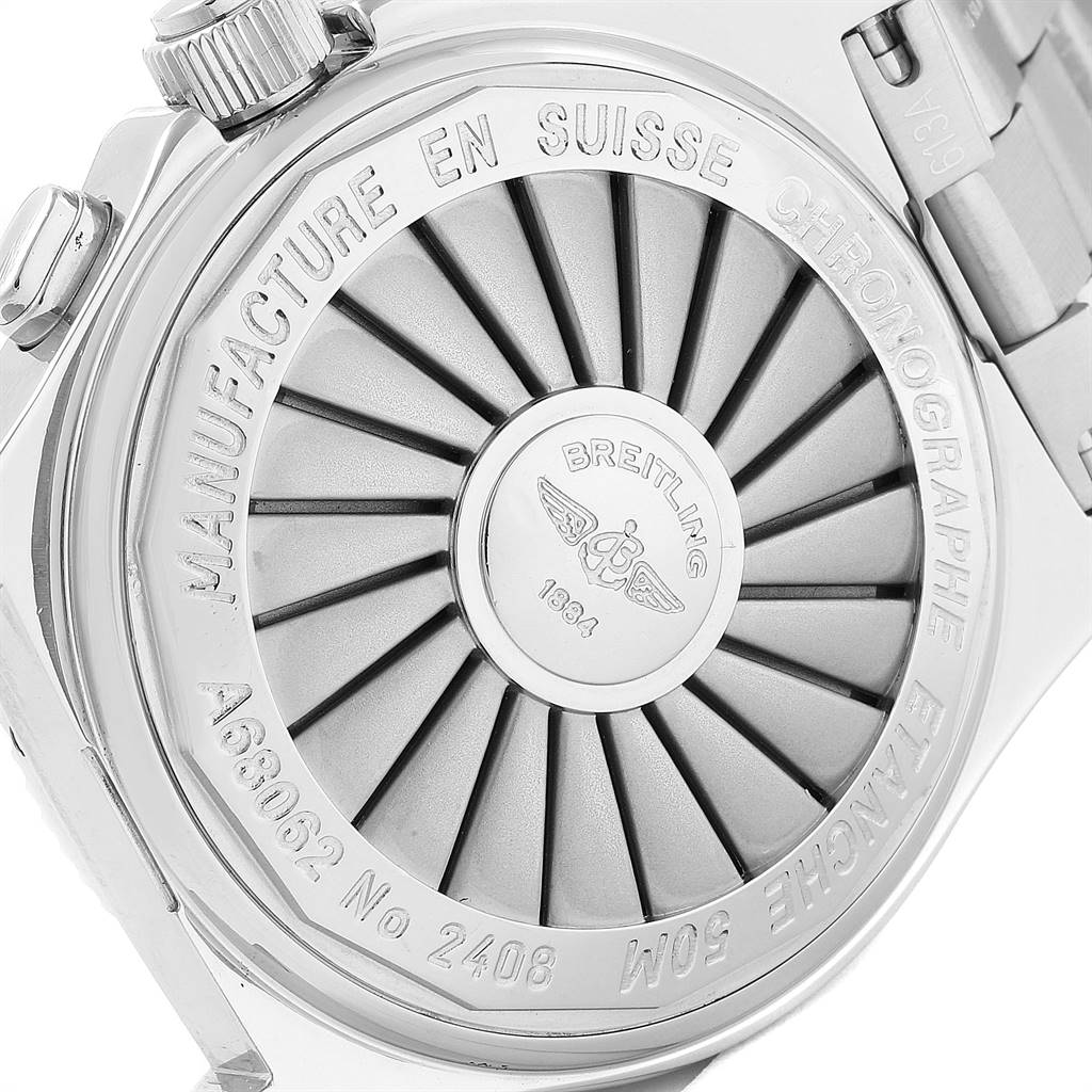 The image shows the back case of a Breitling Professional Series A68062 Men's Stainless Steel Grey Dial A68062 Men's Stainless Steel Grey Dial watch, highlighting the detailed engraving and intricate design.