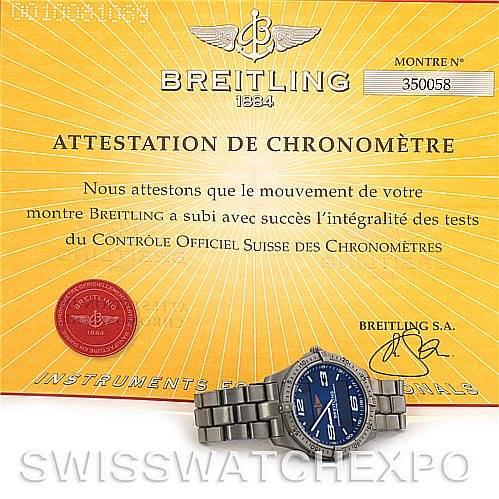 This image shows a Breitling Professional Series E75362 Men's Titanium Blue Dial E75362 Men's Titanium Blue Dial watch placed in front of its Attestation de Chronomètre certificate.