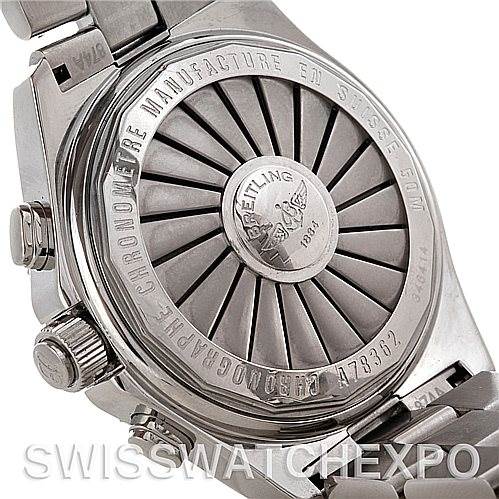 The image shows the back case of a Breitling Professional Series A78362 Stainless Steel Blue Dial A78362 Stainless Steel Blue Dial watch, highlighting its engravings and bracelet attachment.