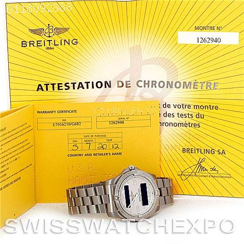 The image shows a Breitling Professional Series E79362 Men's Titanium Silver Dial E79362 Men's Titanium Silver Dial watch positioned in front with its warranty certificate and chronometer certificate.
