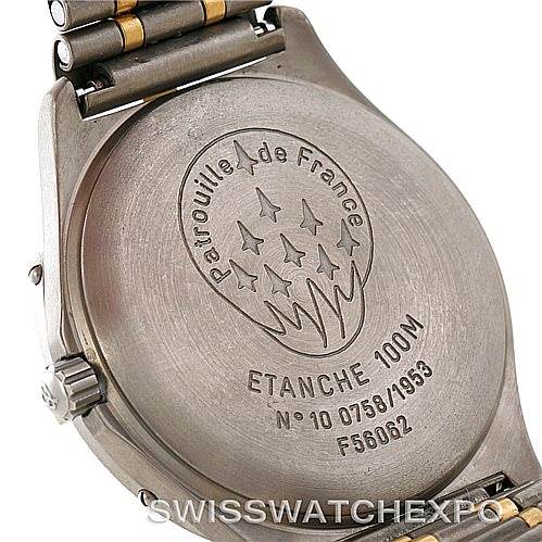 The image shows the case back of a Breitling Professional Series F56062 Men's Titanium Blue Dial F56062 Men's Titanium Blue Dial watch, featuring engravings and a partial view of the bracelet.