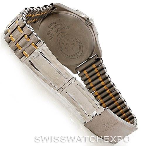 The image shows the back case and bracelet of a Breitling Professional Series F56062 Men's Titanium Blue Dial F56062 Men's Titanium Blue Dial watch, highlighting the clasp and two-tone links.