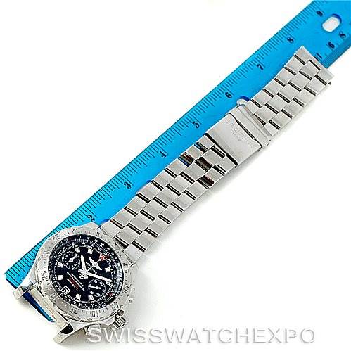 The image shows a top-down view of a Breitling Professional Series A27362 Men's Stainless Steel Black Dial A27362 Men's Stainless Steel Black Dial watch with a metal strap, placed next to a blue ruler.