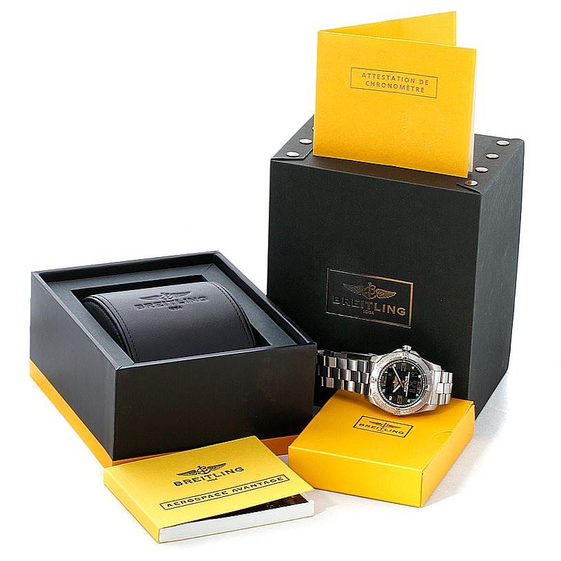 The Professional Series Breitling watch is shown with its box, warranty card, and instruction booklet from a slightly elevated angle.