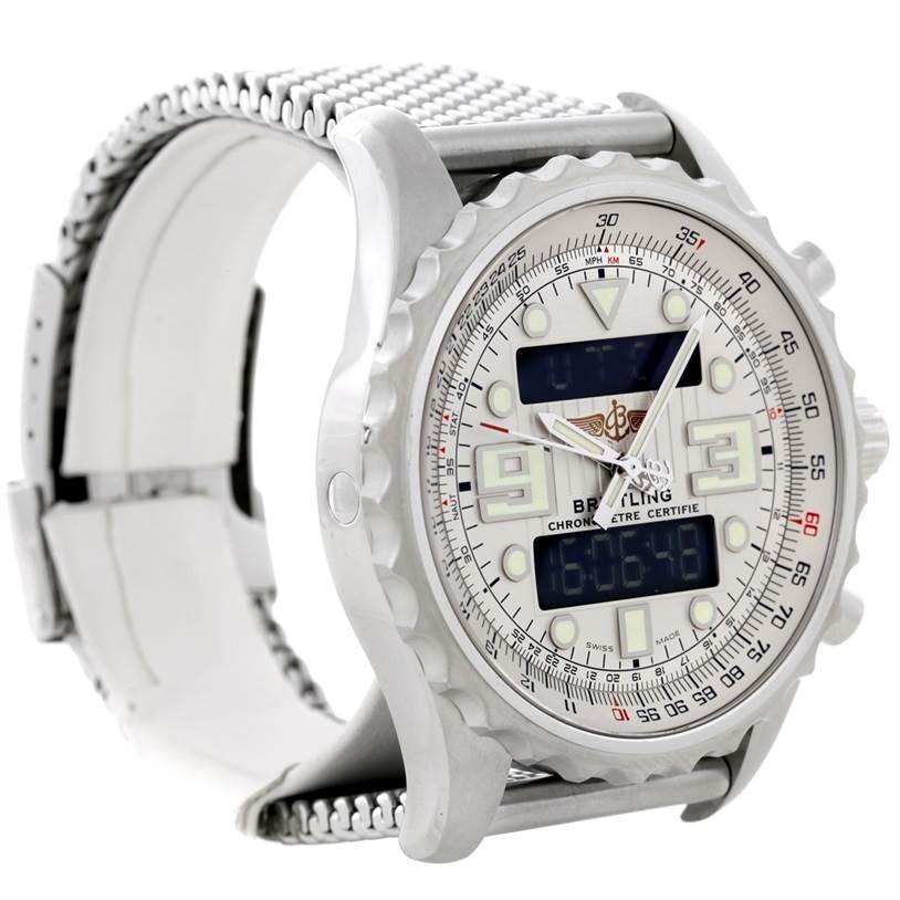 The image shows a side angle of a Breitling Professional Series A78365 Men's Stainless Steel Silver Dial A78365 Men's Stainless Steel Silver Dial watch, highlighting its face, bezel, crown, and mesh strap.