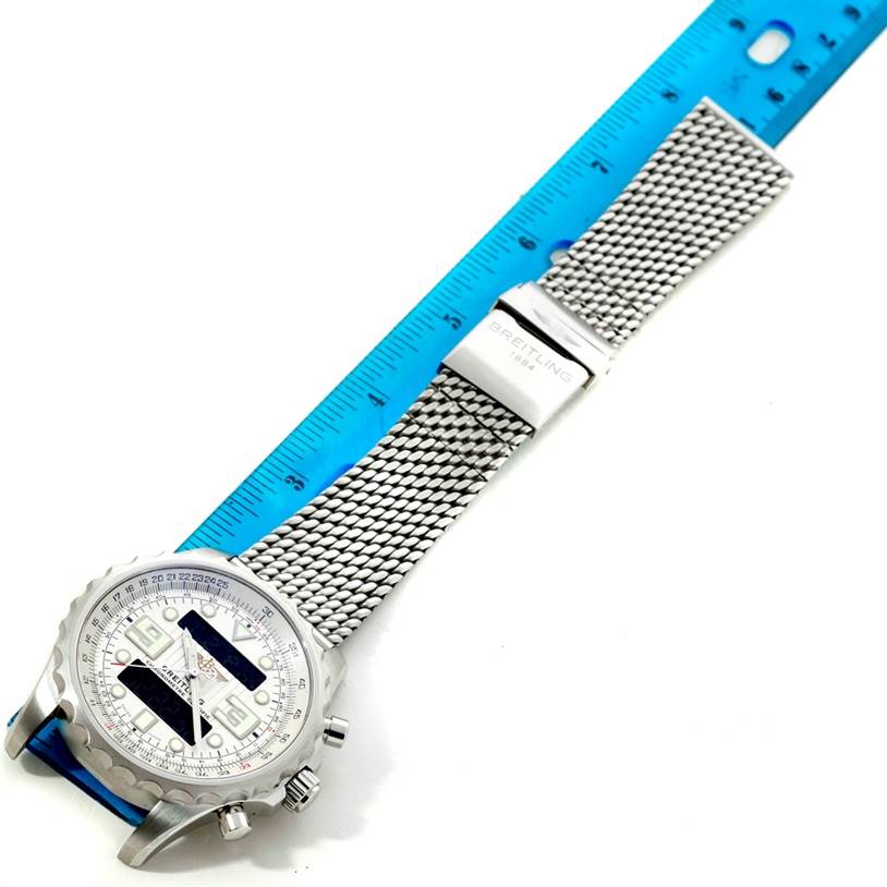 The Breitling Professional Series A78365 Men's Stainless Steel Silver Dial A78365 Men's Stainless Steel Silver Dial watch is shown flat with its face, mesh strap, clasp, and a blue ruler for scale.