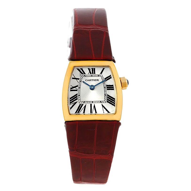 The La Dona watch by Cartier is shown from the front, displaying its face and brown strap.
