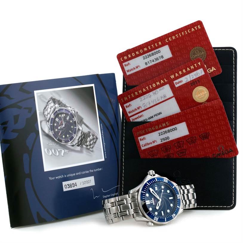 The Omega Seamaster 2226.80.00 Men
s Stainless Steel Blue Dial 2226.80.00 Men
s Stainless Steel Blue Dial watch is shown from the front, along with its booklet, warranty, and chronometer certificate cards.