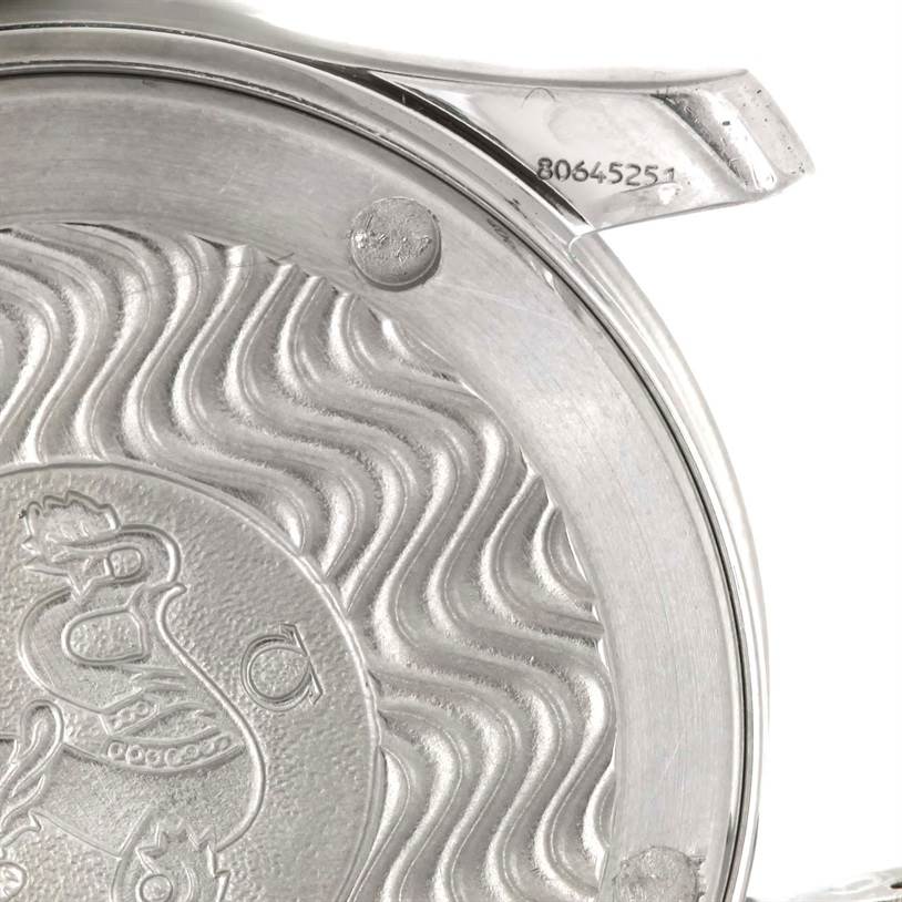 The image shows the back case of an Omega Seamaster 2551.80.00 Men
s Stainless Steel Blue Dial 2551.80.00 Men
s Stainless Steel Blue Dial watch, highlighting the engraved details and serial number.