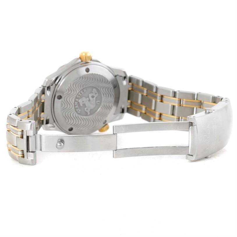 The image shows the Omega Seamaster Men's Steel and Gold (two tone) White Dial Men's Steel and Gold (two tone) White Dial watch from the rear, highlighting the case back and the bracelet with a clasp.