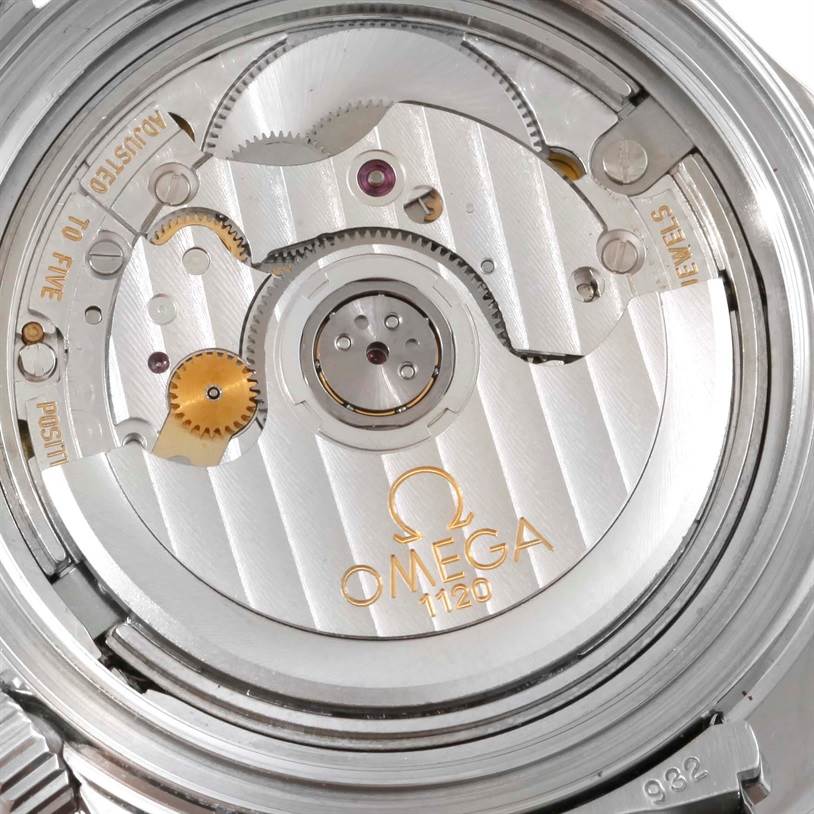 The image shows a close-up of the movement and internal components of an Omega Seamaster 2252.50.00 Stainless Steel Black Dial 2252.50.00 Stainless Steel Black Dial watch.