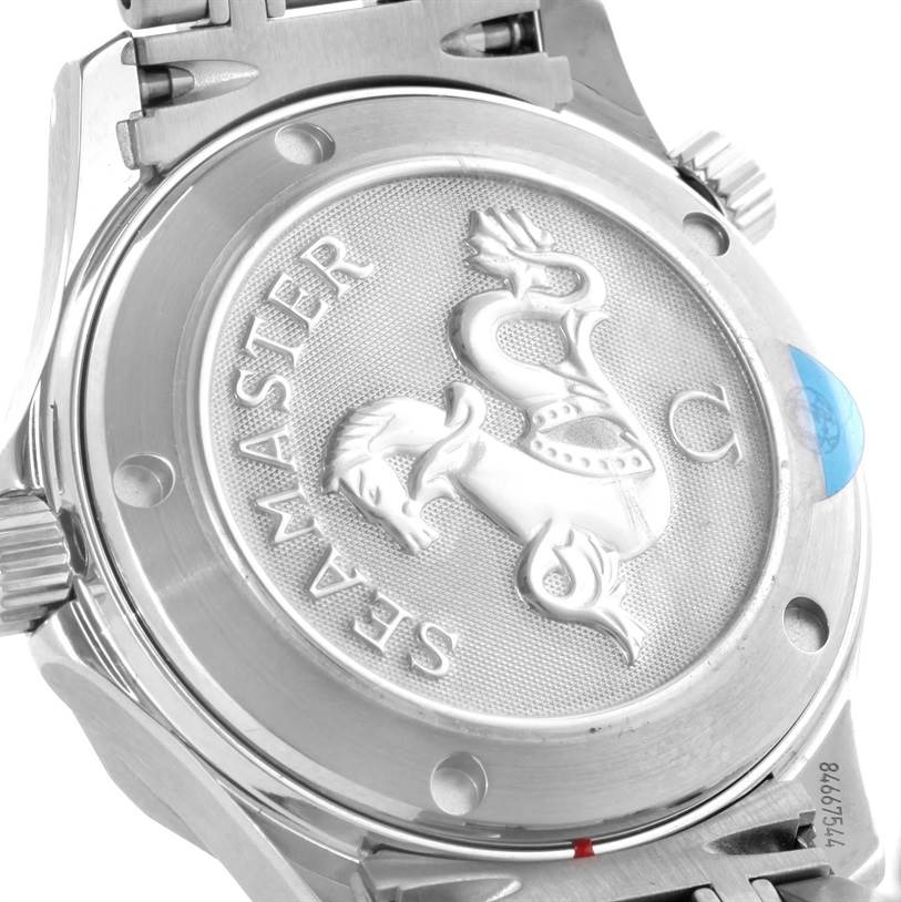 The image shows the back case of an Omega Seamaster 2222.80.00 Men
s Stainless Steel Blue Dial 2222.80.00 Men
s Stainless Steel Blue Dial watch, highlighting the engraved logo and detailed design.