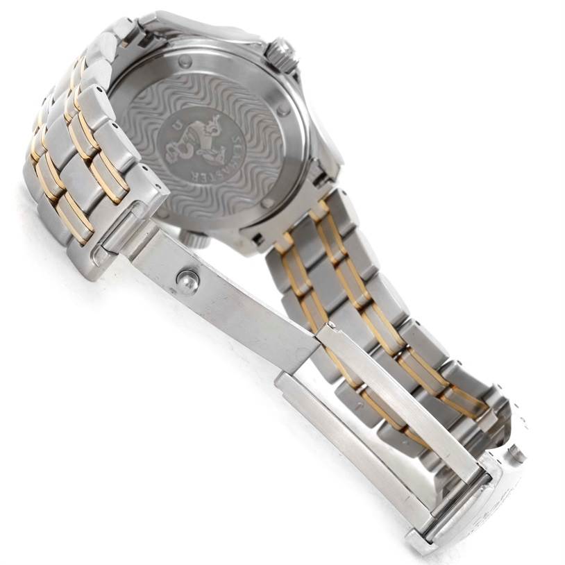 The image shows the back case and partial bracelet of an Omega Seamaster Men's Stainless Steel Black Dial Men's Stainless Steel Black Dial watch with part of the clasp visible.