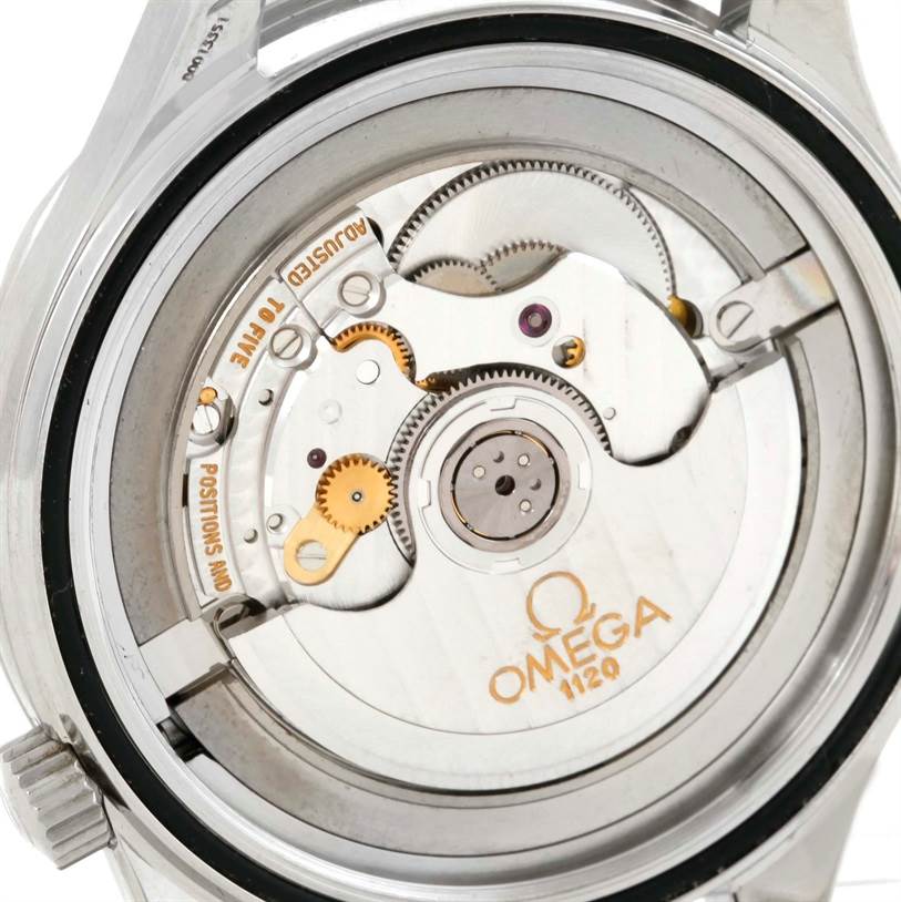 The image shows the Omega Seamaster 2254.50.00 Men
s Stainless Steel Black Dial 2254.50.00 Men
s Stainless Steel Black Dial model
s open case back, revealing its intricate mechanical movement.
