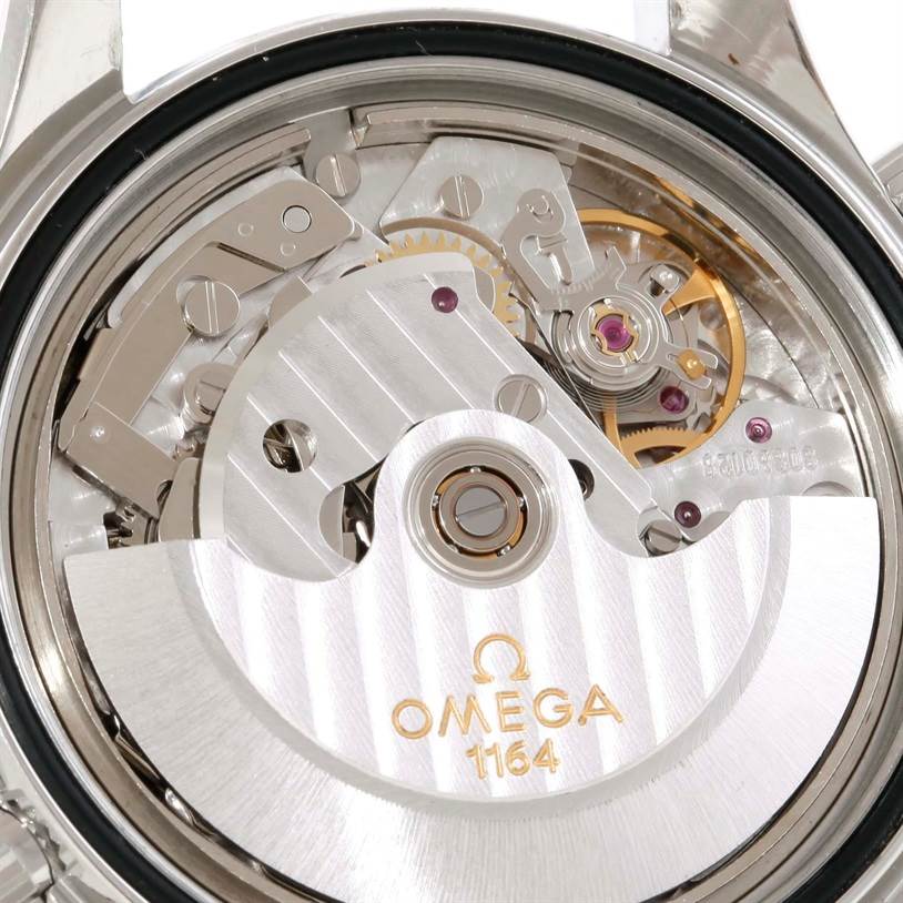 The image shows the back of an Omega Seamaster 2599.80.00 Men
s Stainless Steel Blue Dial 2599.80.00 Men
s Stainless Steel Blue Dial watch, highlighting its intricate movement and mechanical parts.