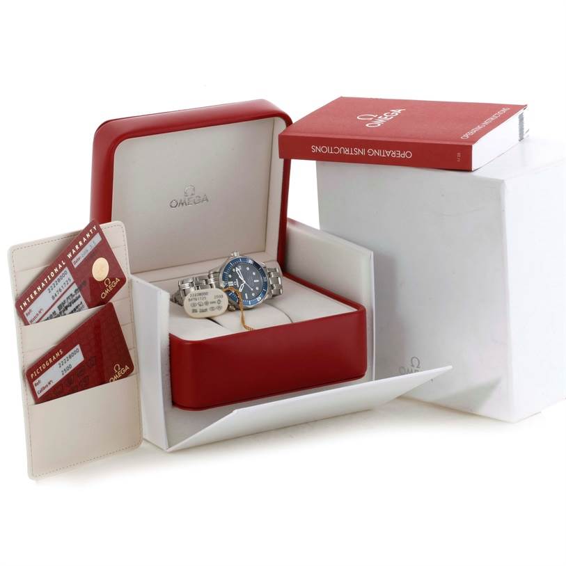 The Omega Seamaster 2222.80.00 Men
s Stainless Steel Blue Dial 2222.80.00 Men
s Stainless Steel Blue Dial watch is shown in its open box along with warranty cards, instructions, and packaging.