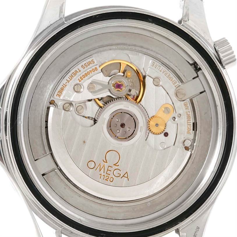 The image shows the detailed view of the Omega Seamaster 2537.80.00 Men
s Stainless Steel Blue Dial 2537.80.00 Men
s Stainless Steel Blue Dial
s automatic movement from the rear, highlighting its intricate mechanics.