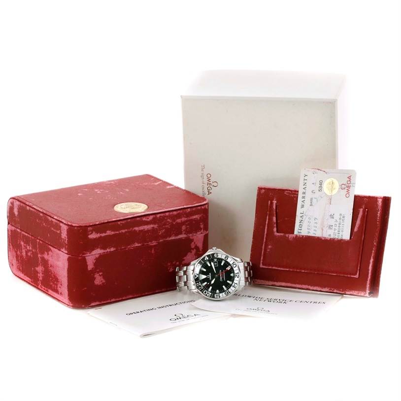 The image shows the Omega Seamaster 2534.50.00 Men's Stainless Steel Black Dial 2534.50.00 Men's Stainless Steel Black Dial watch along with its red box, documents, warranty card, and outer white case.