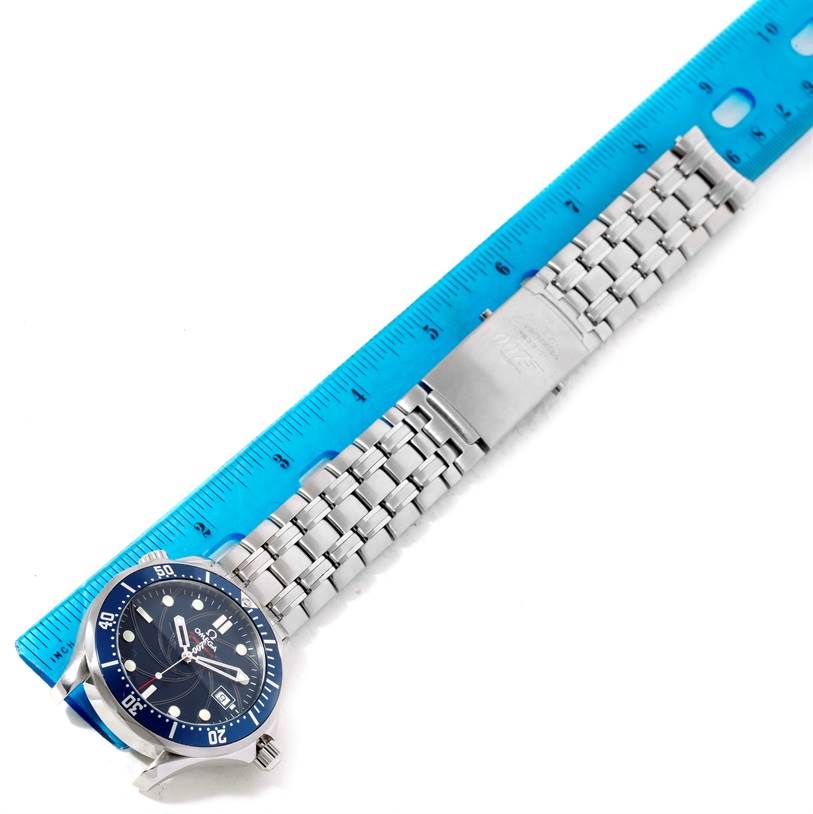 The image shows the Omega Seamaster 2226.80.00 Men
s Stainless Steel Blue Dial 2226.80.00 Men
s Stainless Steel Blue Dial watch positioned flat with a blue ruler measuring its length.