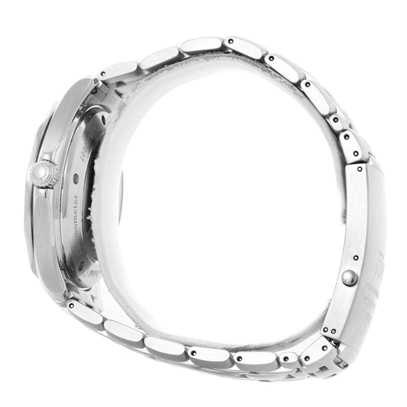 Side view of the Omega Seamaster 2226.80.00 Men
s Stainless Steel Blue Dial 2226.80.00 Men
s Stainless Steel Blue Dial, showing the watch
s case, crown, and partially the bracelet links.