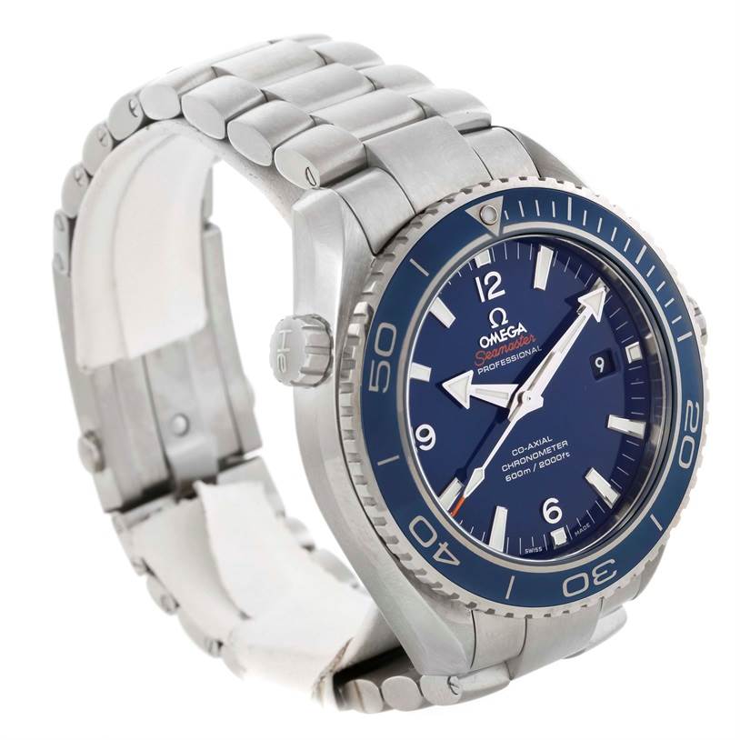 The image shows a side-angle view of an Omega Seamaster 232.90.46.21.03.001 Men
s Titanium Blue Dial 232.90.46.21.03.001 Men
s Titanium Blue Dial watch, highlighting its dial, bezel, crown, and metal bracelet.